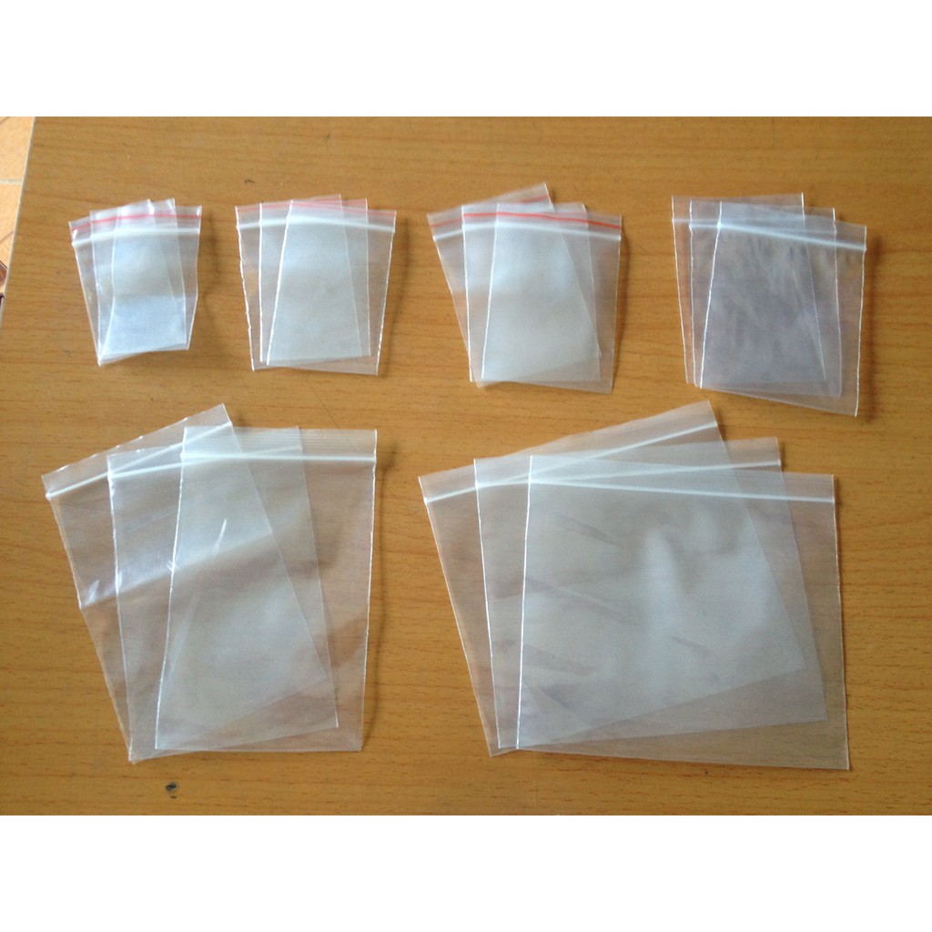 Túi zipper mini, có miết và viền chỉ đỏ không in chữ
