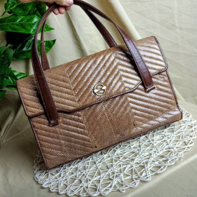 Túi xách tay da rắn