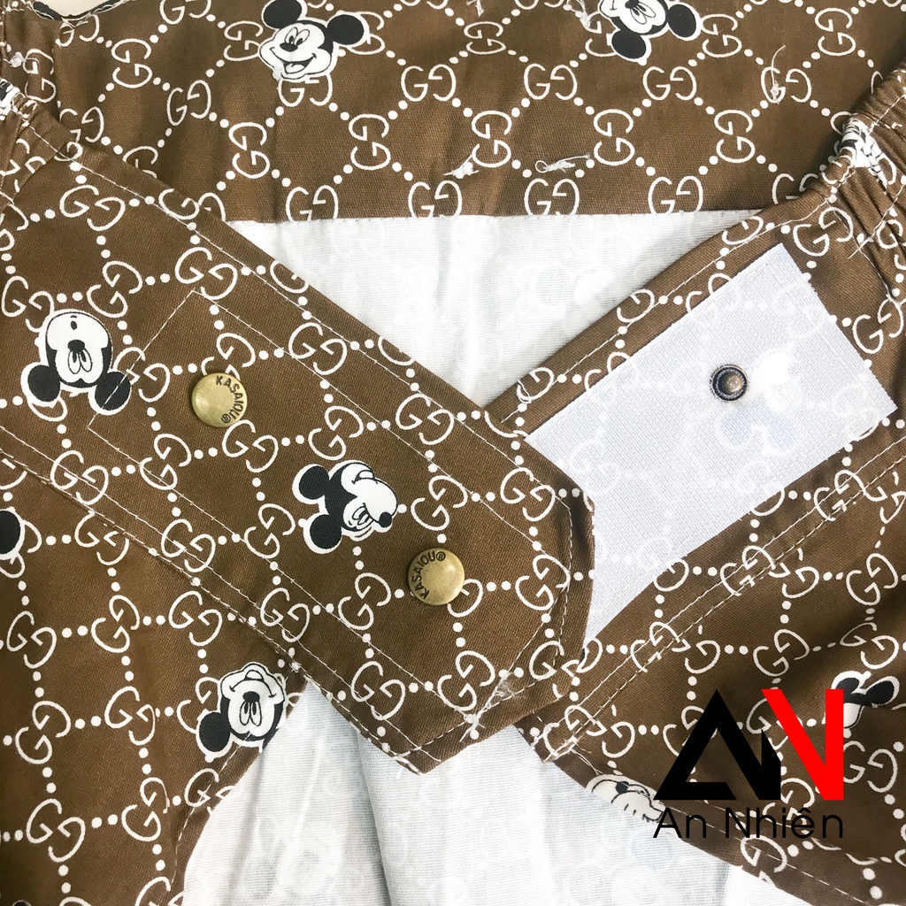 váy chống nắng xẻ tà có túi phía trước cố định bằng miếng dán kết hợp nút bấm - dưới chân váy có nút bấm