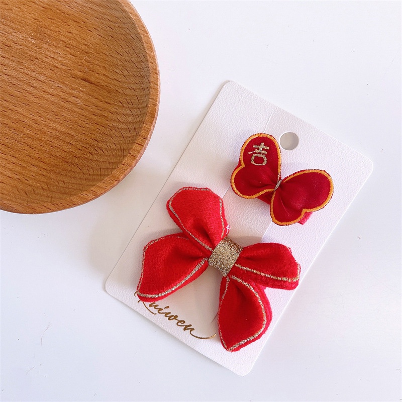 Kẹp tóc xinh xắn thời trang năm mới cho bé gái