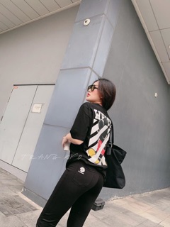 Quần legging in hoa cúc vàng
