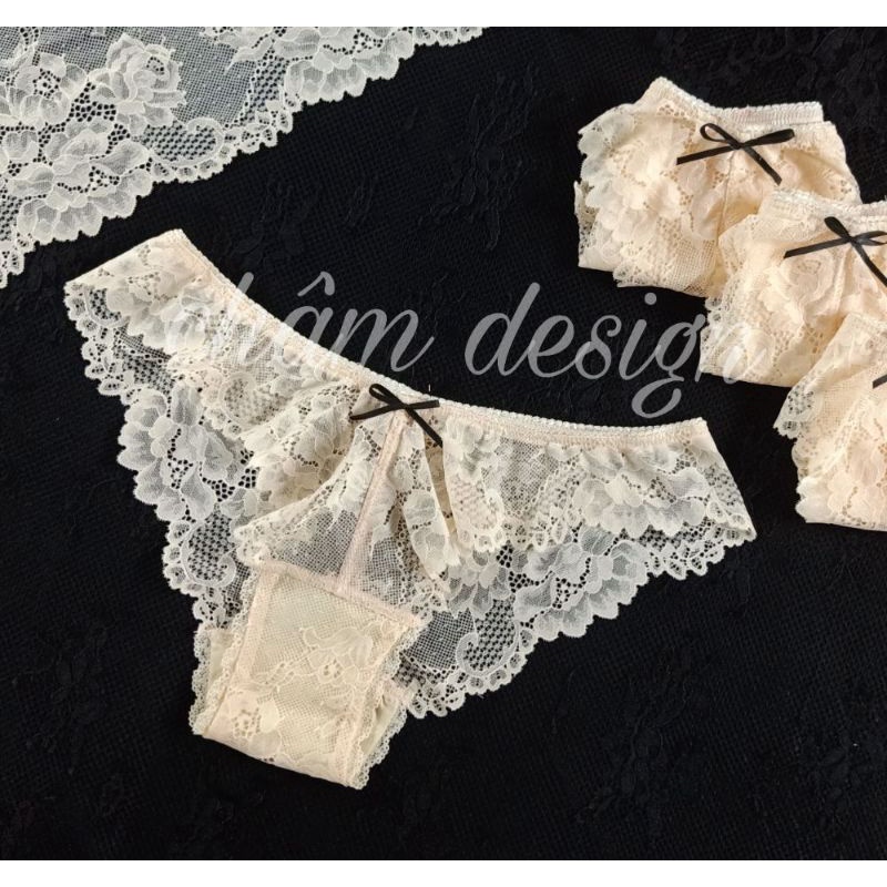 quần lót ren gam màu hồng cam nhẹ gắn nơ đen xinh xắn .Hàng thiết kế độc quyền tại shop