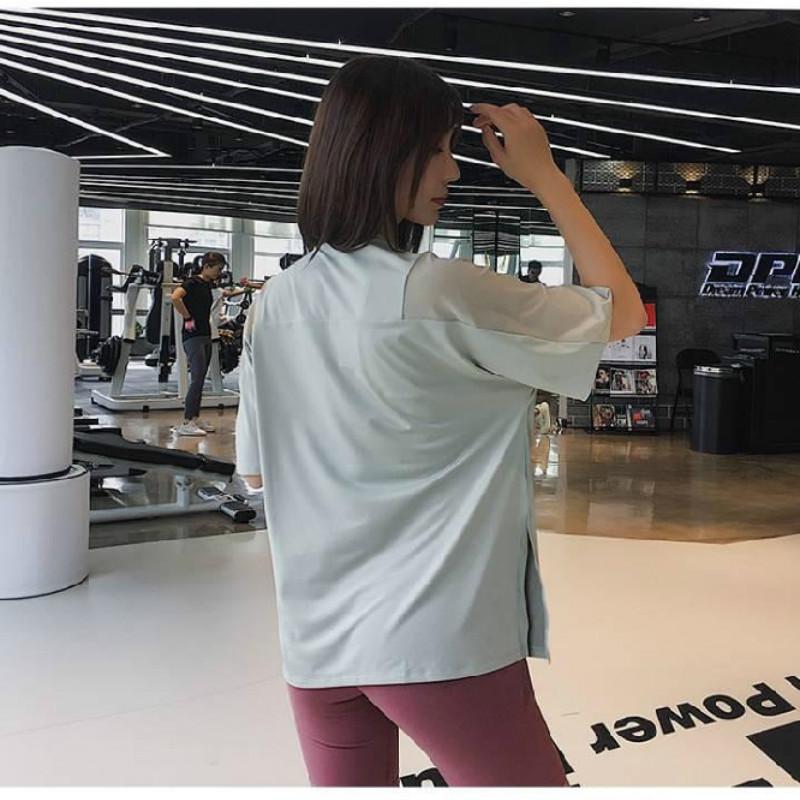 Áo thun thể thao tay ngắn form rộng màu trơn thoáng khí cho nữ