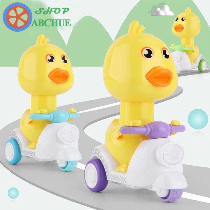 Đồ chơi trẻ em vịt con chạy xe vespa