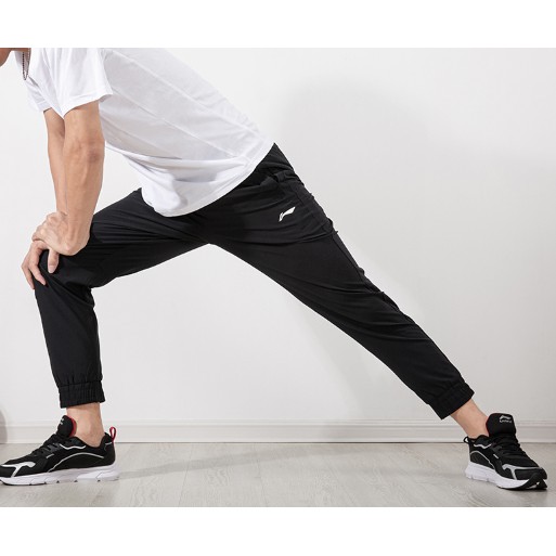 Quần gió nam Lining - bó gấu