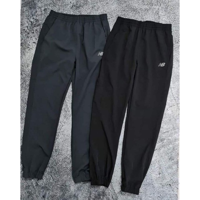 Quần jogger gió nam chống mưa nhẹ NB xuất xịn
