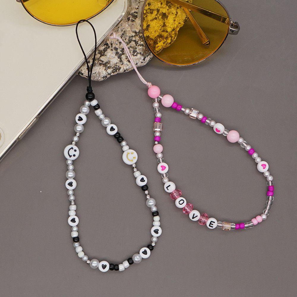 Dây Đeo Điện Thoại Dạng Chuỗi Hạt Màu Trắng Đen Chống Thất Lạc Phong Cách Boho