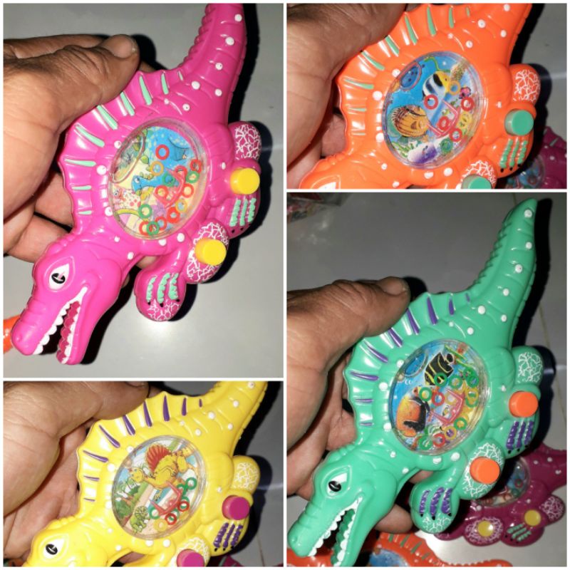 Một chiếc game bấm nước hình khủng long bằng nhựa