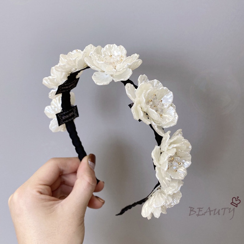 Seven Miss Cài tóc đính hoa phong cách xinh xắn cho nữ