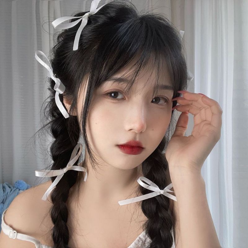 kẹp tóc nơ mảnh trắng ( giá 1c)
