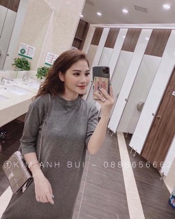 Váy suông tay lỡ.