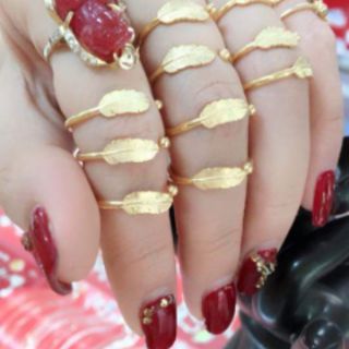Nhẫn lông vũ bạc và xi vàng