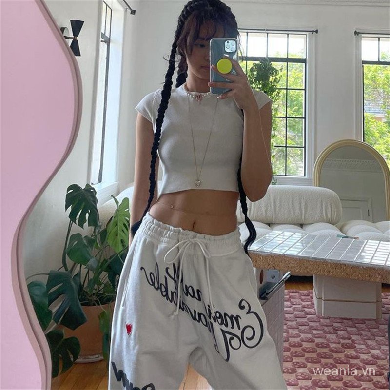 Quần dài lưng cao phối dây rút in chữ cá tính cho nữ