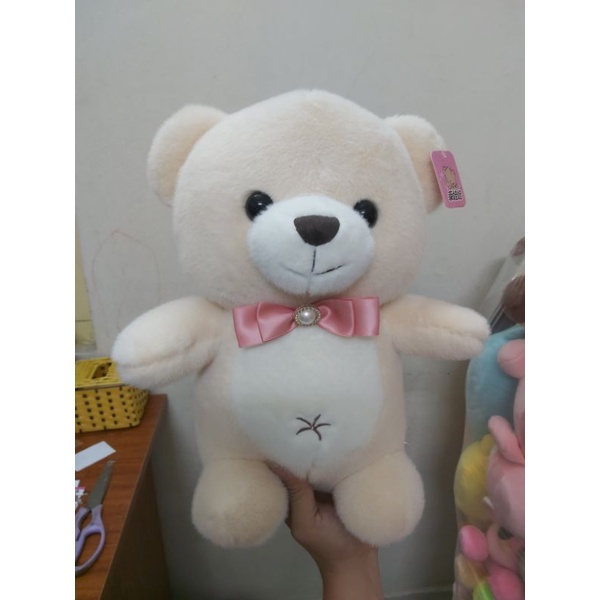 Gấu Teddy đeo nơ ngọc