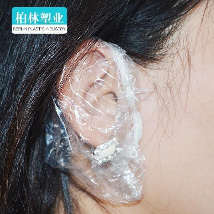 Bịt tai nilon dùng 1 lần cho Salon(gói 100 cái)