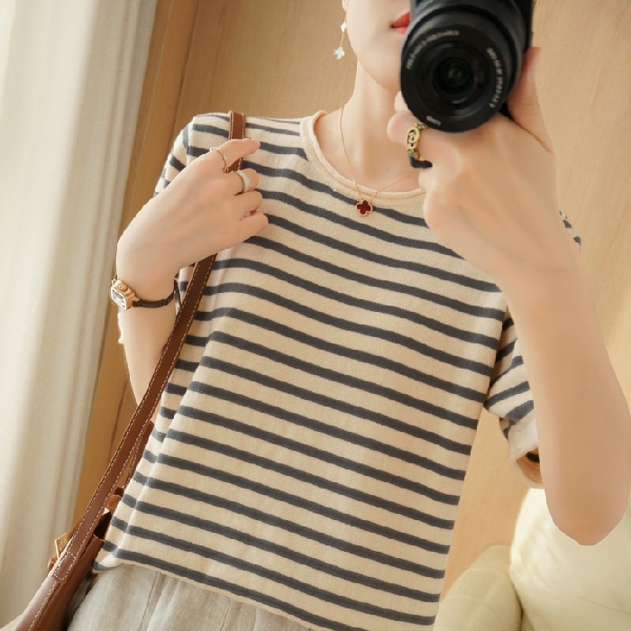 Áo thun tay ngắn cổ tròn dáng rộng chất liệu cotton lanh dáng rộng cho nữ