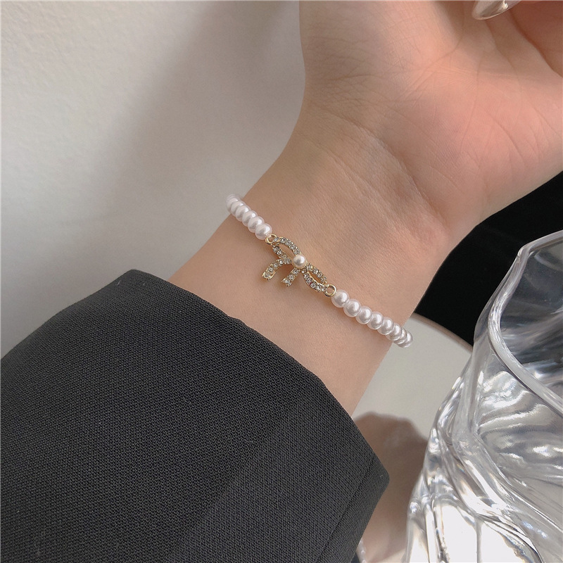 Vòng Tay Đính Đá Zircon Ngọc Trai Hình Nơ Xinh Xắn Cho Nữ