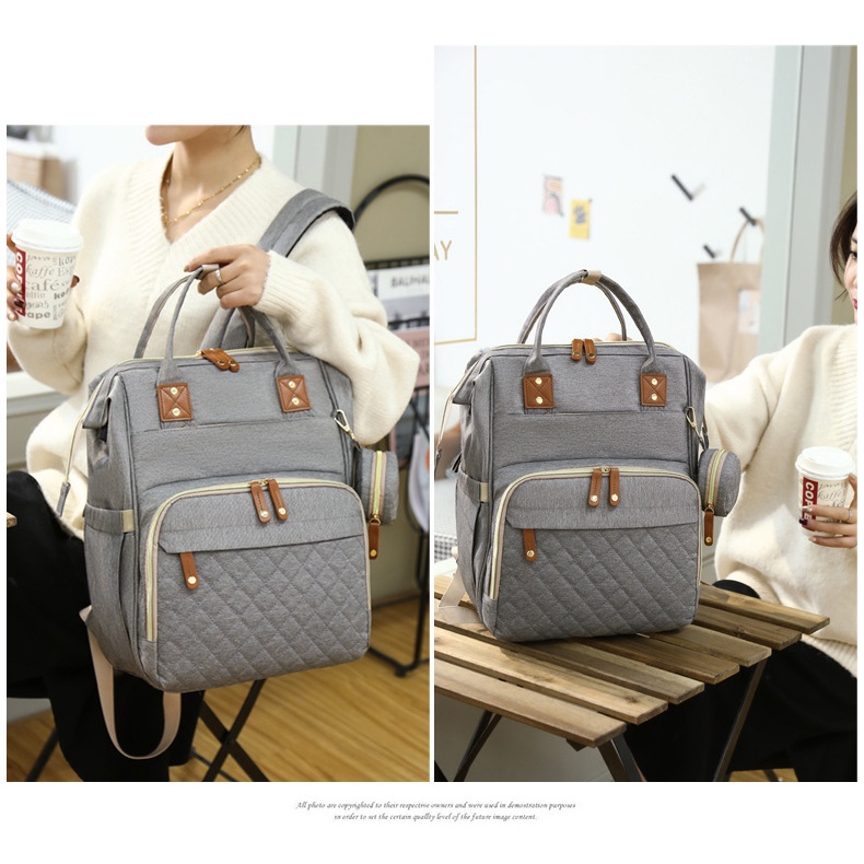 Balo bỉm sữa đa năng cho mẹ và bé cao cấp có thể làm giường nằm cho trẻ,nhiều ngăn đựng chống thấm nước tiện dụng