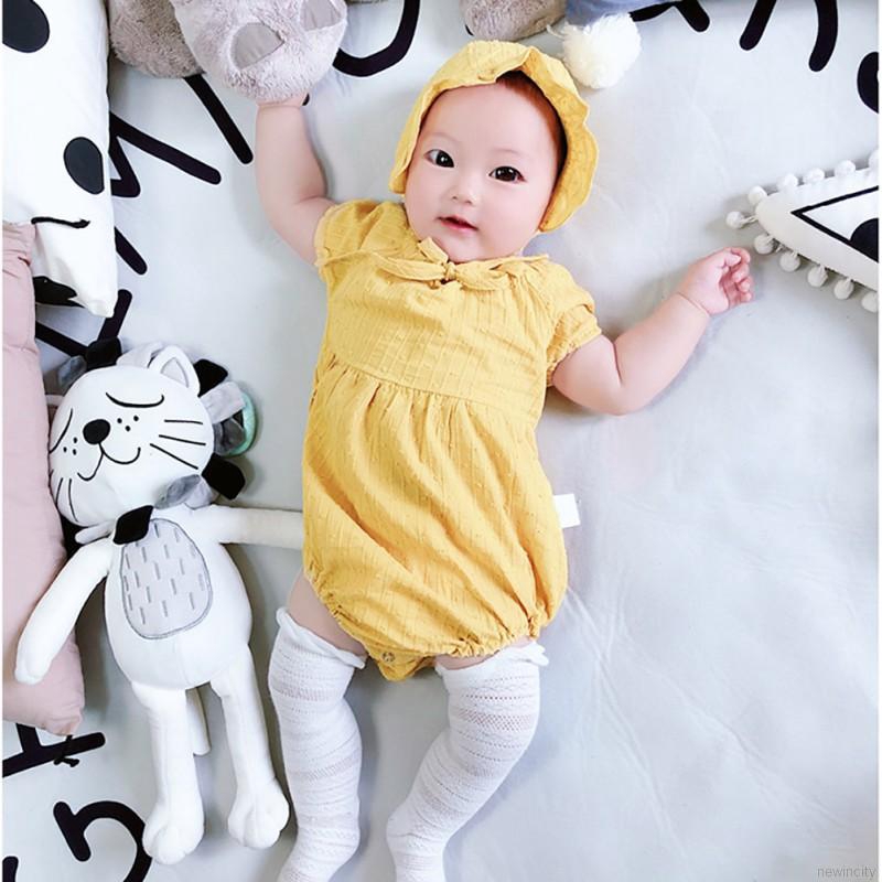 Set jumpsuit cổ tròn tay phồng + nón cho bé