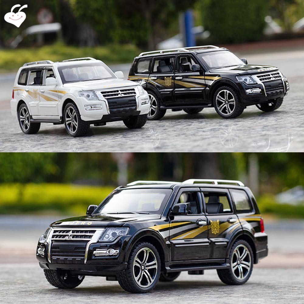 Mô Hình Xe Hơi Thể Thao Mitsubishi Pajero Bằng Hợp Kim Có Đèn Và Nhạc Mở Cửa Mở Được Giáo Dục Sớm Cho Trẻ