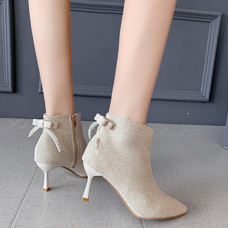 ❆△2020 autumn and winter new bow beige short boots female stiletto pointed high-heel Martin wild ankle nude