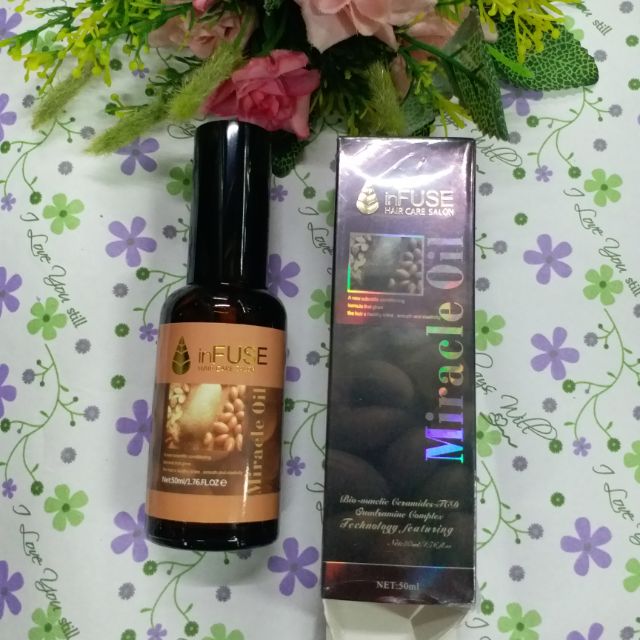 Tinh dầu dưỡng tóc miracle oil  infuse