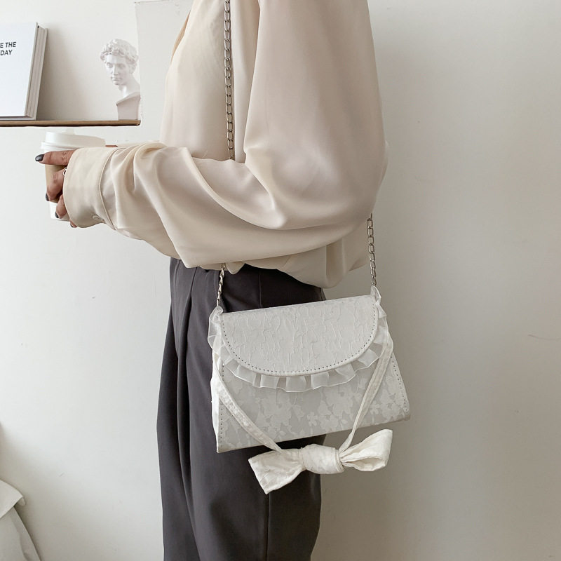 Túi xách vải ren thắt nút phong cách thời trang nữ | BigBuy360 - bigbuy360.vn