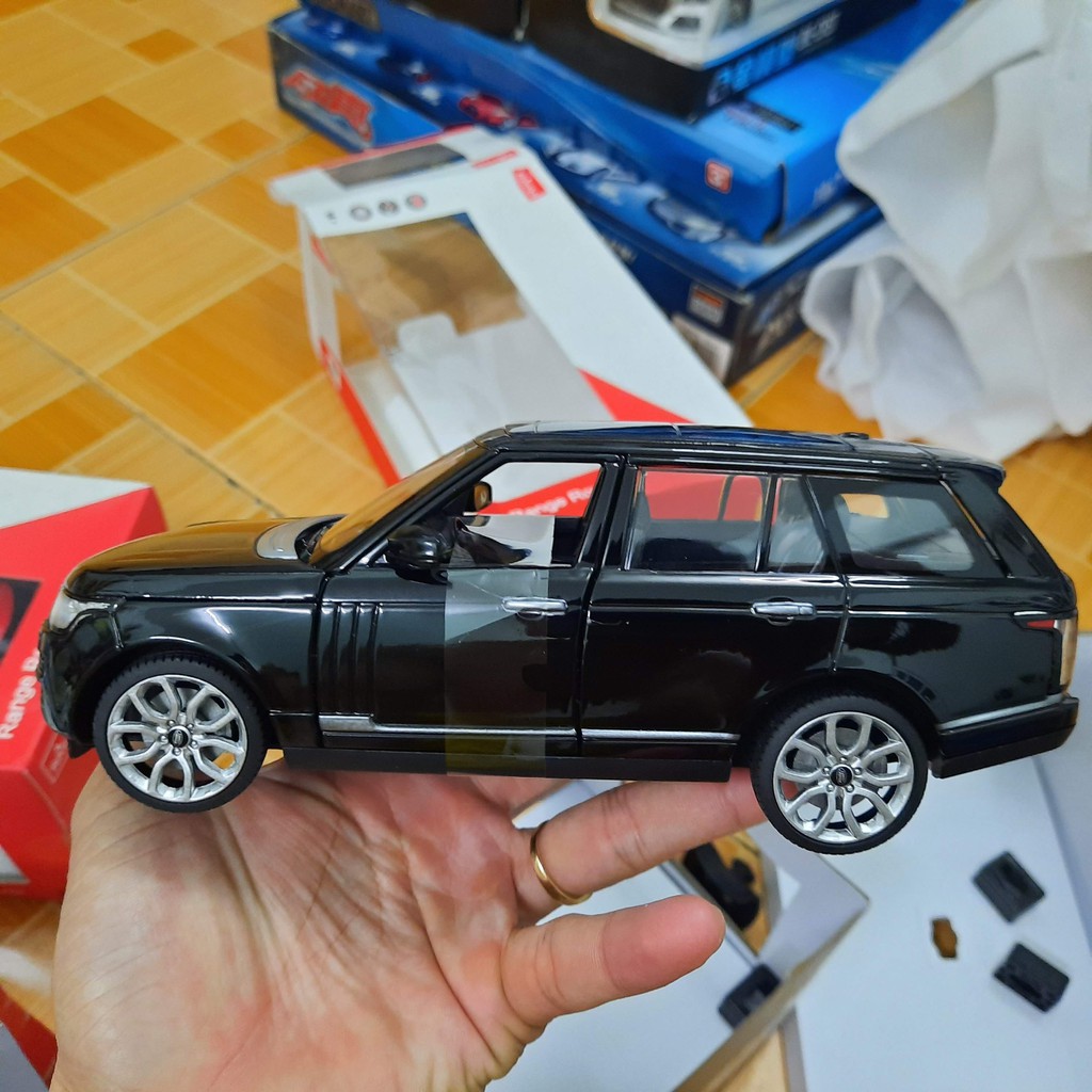 Xe ô tô mô hình Range Rover tỉ lệ 1:24 xe ô tô mô hình bằng sắt đồ chơi trẻ em có vô lăng bẻ lái và mở 2 cửa trước