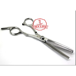 Kéo tỉa tóc VS quoay trắng