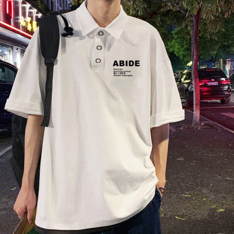Áo Polo Nam Nữ Form Rộng Chất Thun Mềm Mát Phong Cách In Chữ Cái Cool Hợp Thời Trang Bắt Kịp Xu Hướng TTQ0333