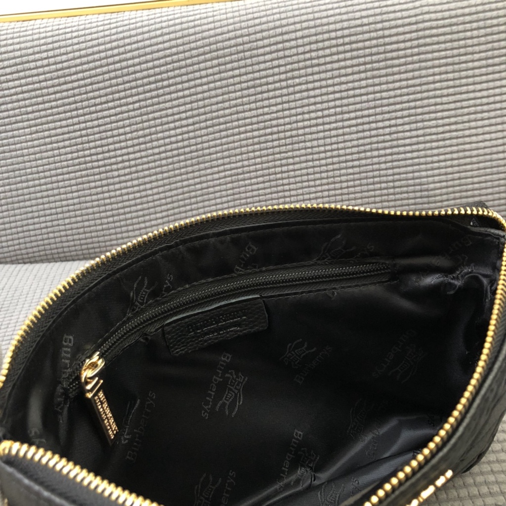 Ví cầm tay nam da thật thời trang cao cấp Burberry BBR phong cách sang trọng, thời thượng