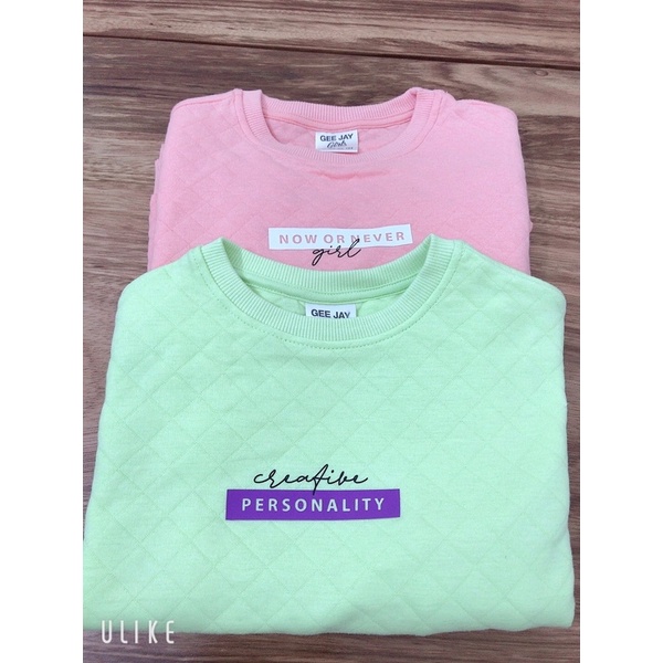 Áo nỉ trần trám bé gái