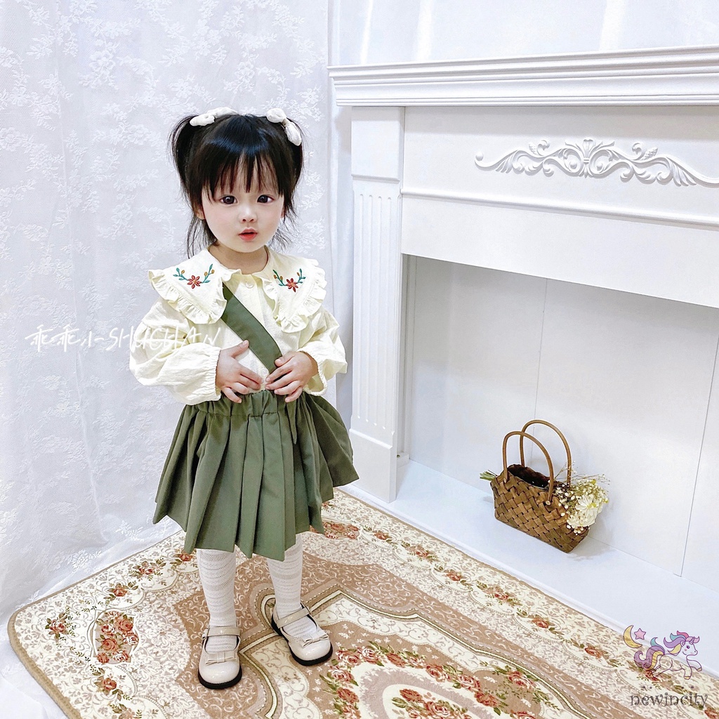 Set áo sơ mi tay dài thêu họa tiết + đầm yếm thời trang cho bé gái