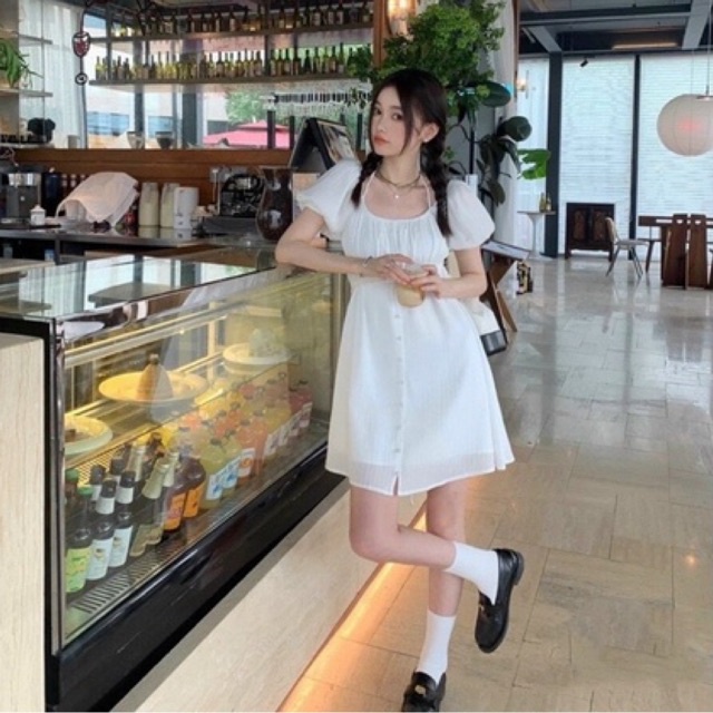 Váy trắng tay phồng đan dây eo nút bọc tiểu thư