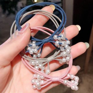 Cột tóc nơ có hạt châu nhỏ