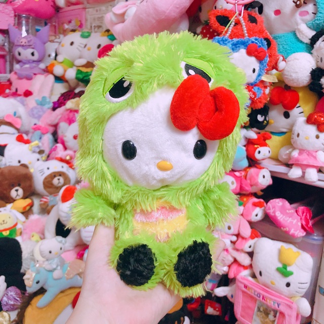 Kitty cosplay khủng long xanh