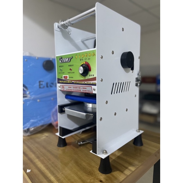 Máy ép miệng ly tự động cuốn màng ép tặng cuộn ép