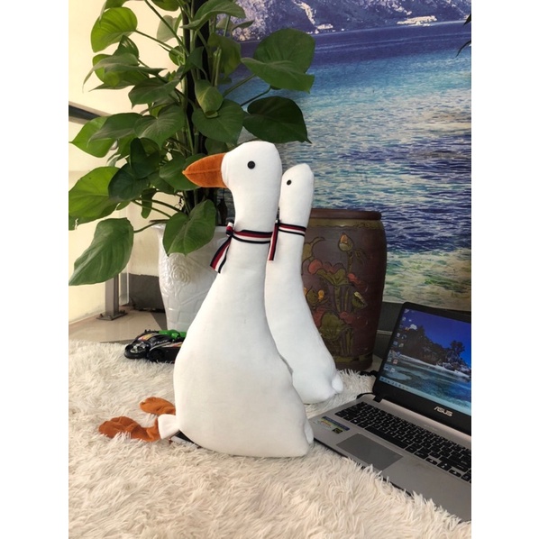Gấu bông gối ôm hình con vịt dài 65cm cute đáng yêu co dãn 4 chiều