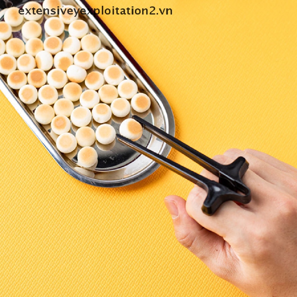 Bộ 2 đũa ăn vặt đeo ngón tay tiện dụng