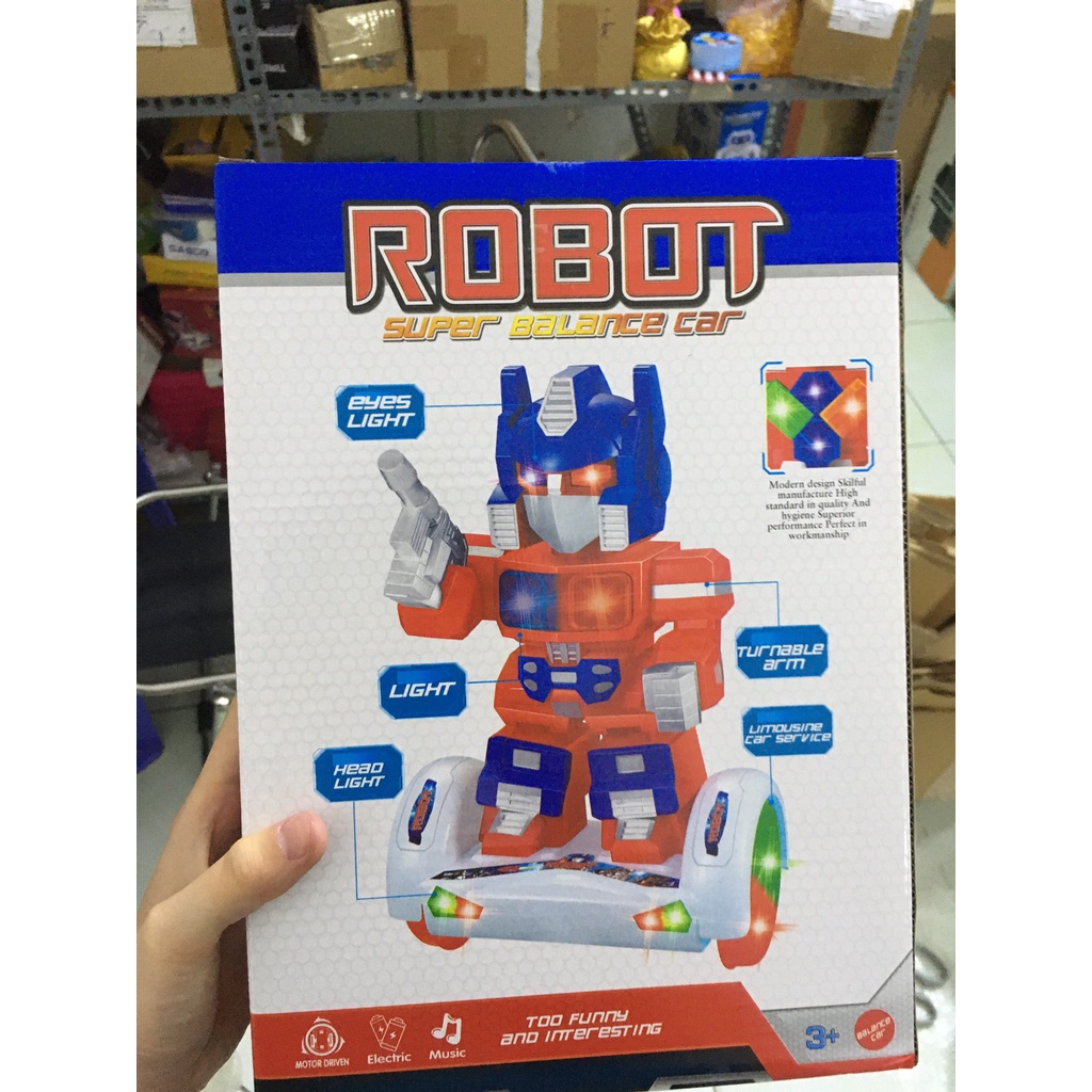 Hộp đồ chơi robot tranformen dùng pin có đèn nhạc