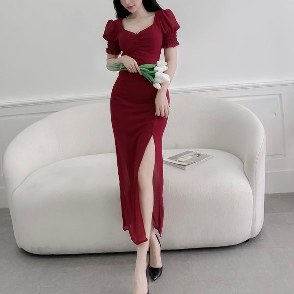 Đầm nhún ngực xẻ tà