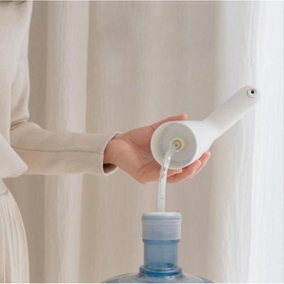 Vòi lấy nước từ bình 1 chạm Pum Two