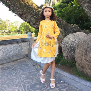 Com bo áo dài Tết cách tân