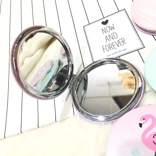 *gương cầm tay:mẫu 2 mặt:1 mặt thường và 1 mặt phóng to