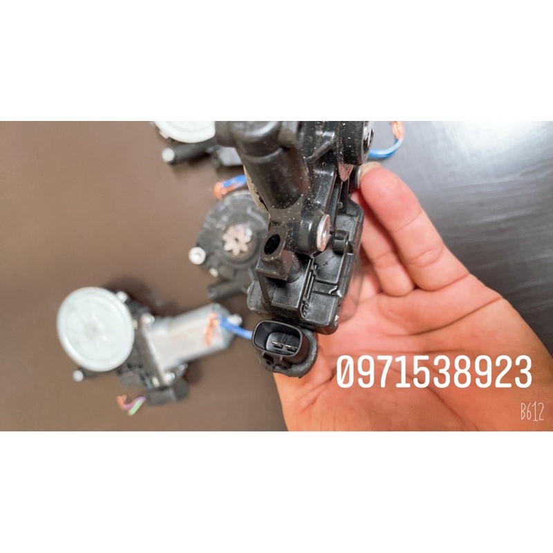 Motor lên xuống kính toyota xịn tháo xe