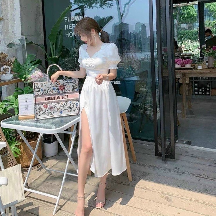 Đầm maxi cổ tim xẻ tà tay ngắn ,tay phồng có mút ngực chất liệu đũi nhăn 1 màu như hình (trắng)