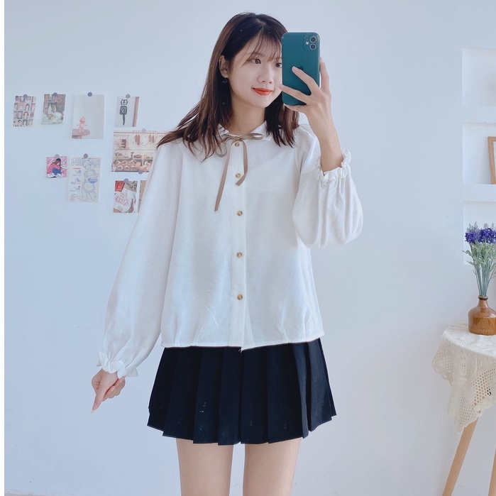 {Evacici}Sơ mi len tăm dài tay cổ tàu kèm nơ cổ điệu pha bèo chất đẹp.