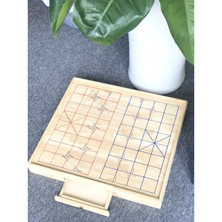 Bàn cờ tướng gỗ Thông có hộc đựng và kèm quân cờ đk 3.5 cm