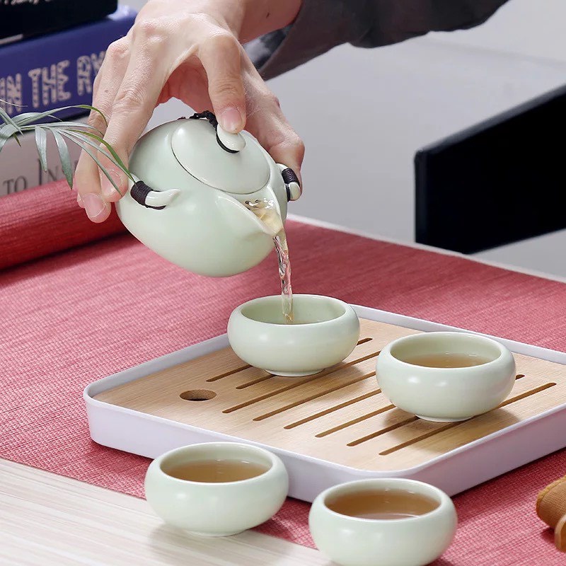 Bộ ấm chén pha trà du lịch bằng sứ cao cấp bộ tách pha trà tử sa có túi xách kèm khay trà và gắp chén tre khăn lau
