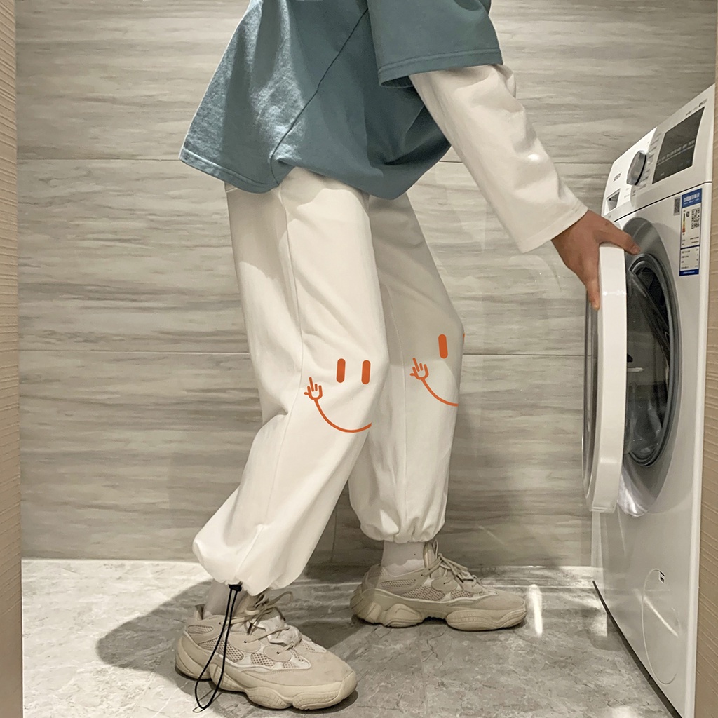 Quần dài thể thao phối dây rút in hoạ tiết mặt cười thời trang đường phố sành điệu cho nam